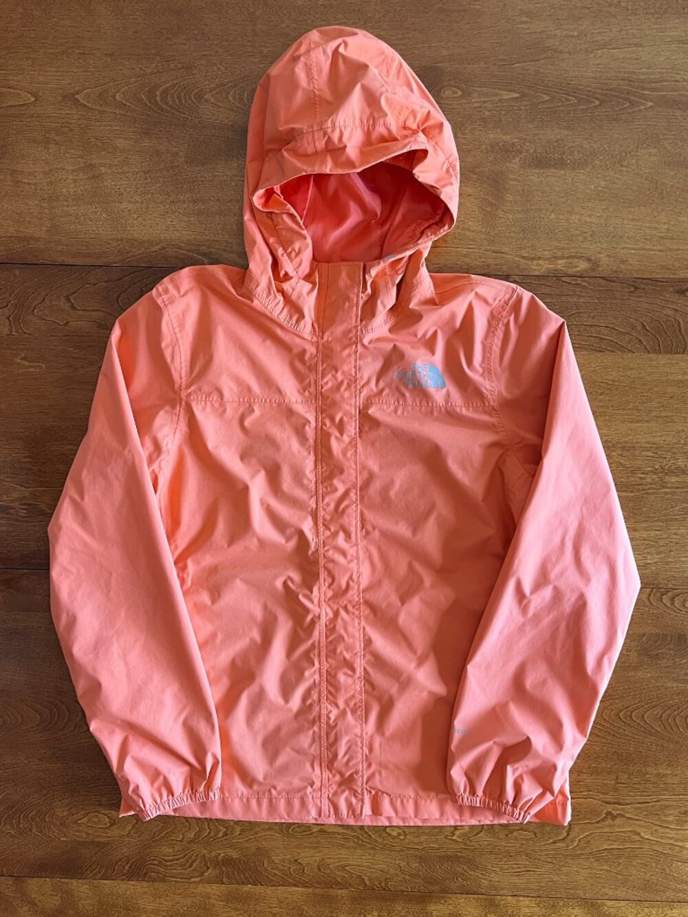 The North Face light coral rainjacket L 14/16